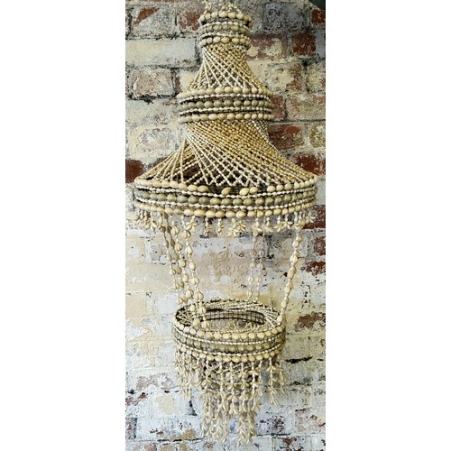 231 - Interior Design - a large Mid 20th century conch shell plant hanging basket of spiralling form, 100c... 