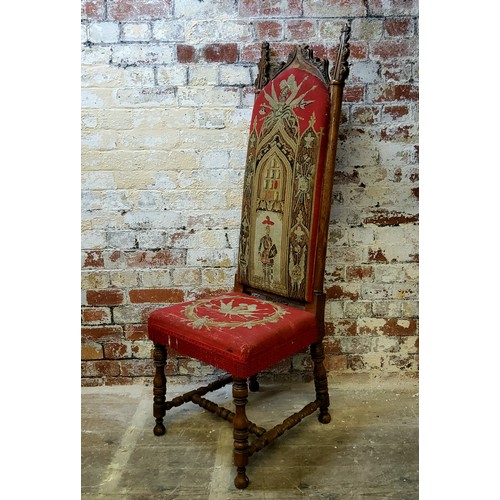 241 - A 19th century Gothic Revival entrance hall chair, arched cresting flanked by foliate spire ears, st... 