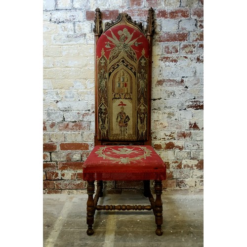 241 - A 19th century Gothic Revival entrance hall chair, arched cresting flanked by foliate spire ears, st... 