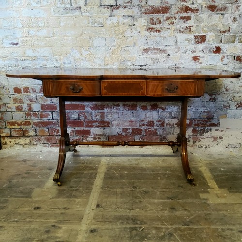 249 - A very good Regency style flamed mahogany and satin wood strung sofa table, the inverted breakfront ... 