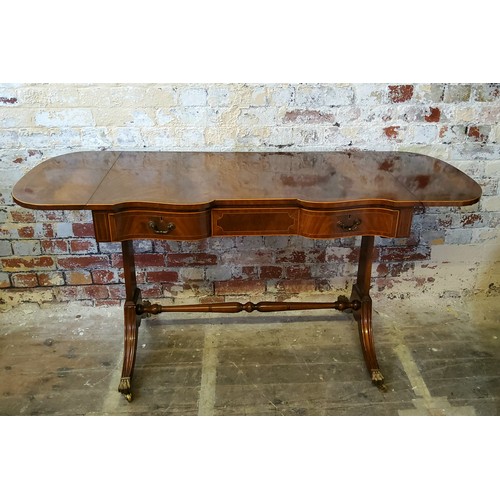 249 - A very good Regency style flamed mahogany and satin wood strung sofa table, the inverted breakfront ... 