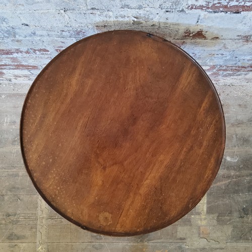 251 - A George III one piece mahogany dished and tilt top wine table c.1800, 53cm diameter x 63cm high