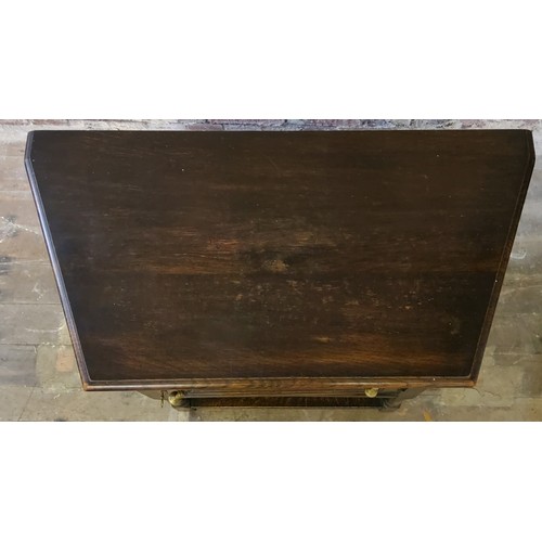 252 - A 19th century Jacobean Revival canted hall cupbboard, heavily carved throughout, single drawer to f... 