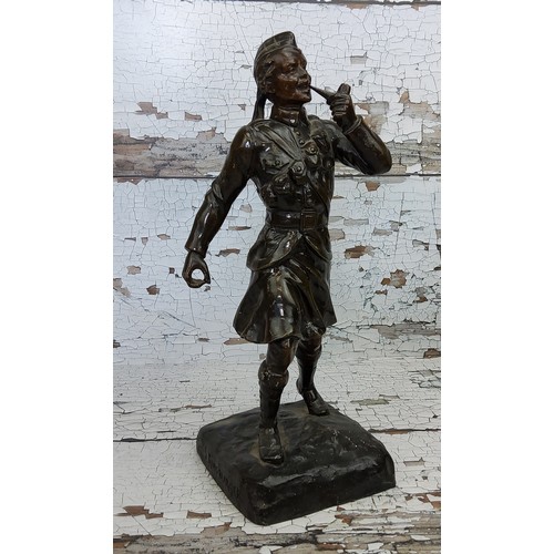 5 - After Sylvain Kinsburger [1855-1935] a bronzed spelter figure of a Kings Own Scottish Borderers... 