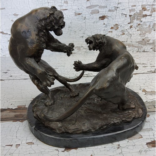 9 - A Franklin Mint bronze 'The Encounter', Francis Shinn, two fighting tigers mounted on a polished mar... 