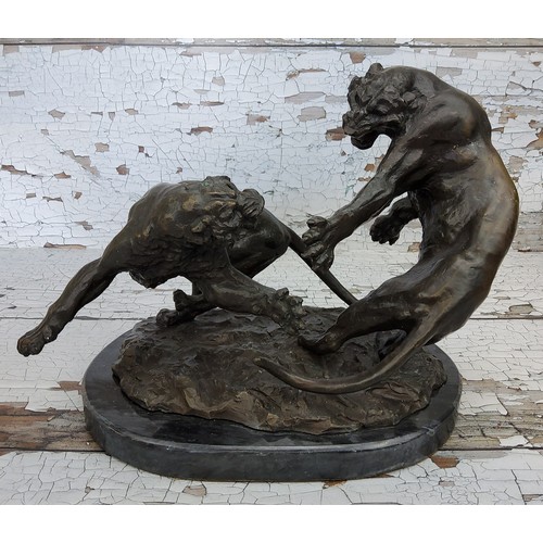 9 - A Franklin Mint bronze 'The Encounter', Francis Shinn, two fighting tigers mounted on a polished mar... 