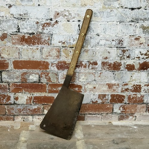 16 - A large early 20th century butcher's meat cleaver, 78cm high