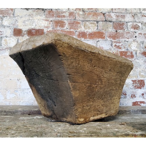 17 - An early farmhouse corn grinder base, possibly 17th century, dug out from a single piece of sawn Eng... 