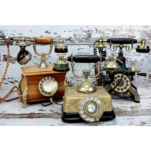 19 - Three early rotary dial telephone reproductions including a 19th century skeleton example (3)