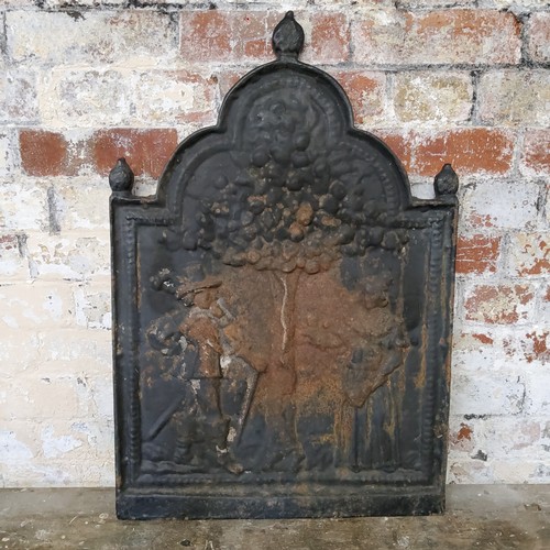 55 - A late18th/ early 19th century cast fire back, decorated in relief with a Dandy and Beau underneath ... 