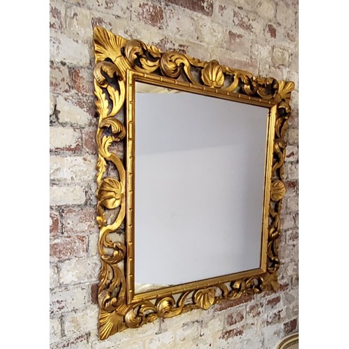 62 - A large Florentine gilt wood rectangular mirror 55 x 66cms