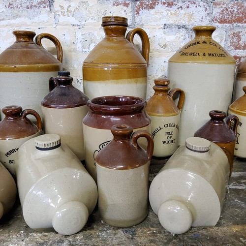 143 - Stoneware - A collection of various stoneware flagons including a Meadowcroft, Attercliffe SHEFFIELD... 