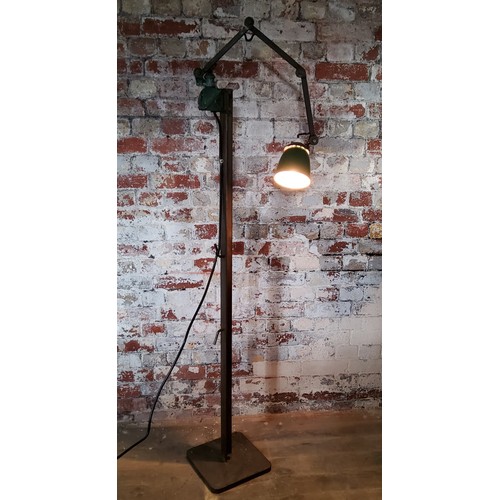 182 - Industrial Design - a factory floor workers freestanding lamp, fabricated heavy gauge steel with ori... 