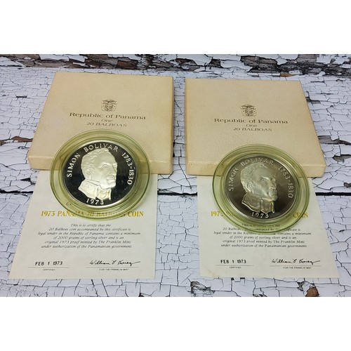 205 - Numismatics - Two 1973 frosted proof Panama 20 Balboas coins, in presentation cases with certificate... 