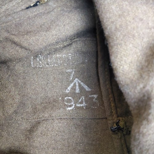 240 - A WWII British Mountain Troops cap (duck cap), marked to the interior with the broad arrow and dated... 