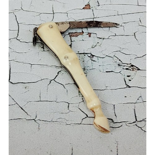 248 - An unusual Edwardian novelty pen knife the Ivory body in the form of a horses leg, the single small ... 