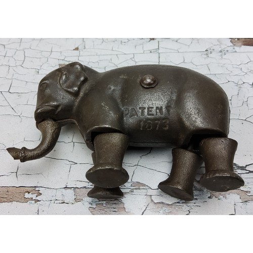 110 - Late 19th Century cast iron walking elephant toy, marked patent 1873, made by the Ives Toy Company o... 