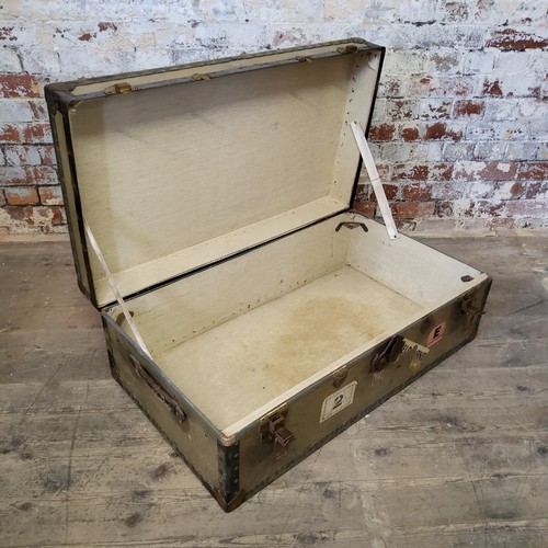 380 - Vintage luggage - an early 20th century travel trunk with shipment labels 93cms wide x 32cms high x ... 