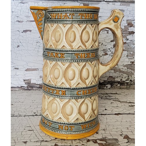 30 - An unusual Victorian Wedgwood majolica 'Caterer' jug, of typical form, painted with coloured glazes ... 