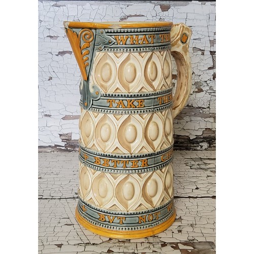 30 - An unusual Victorian Wedgwood majolica 'Caterer' jug, of typical form, painted with coloured glazes ... 