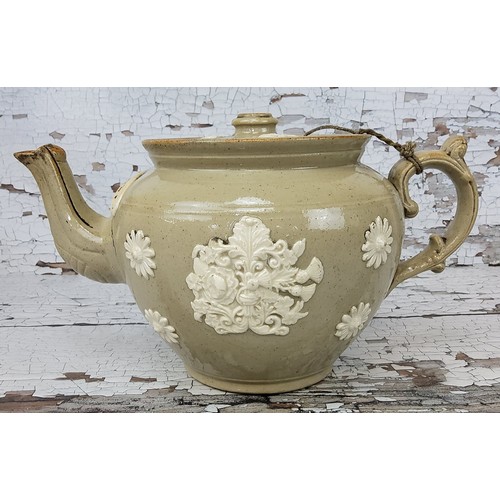 31 - An early bargeware Measham sprigged teapot, applied nameplate above spout A. Thorpe