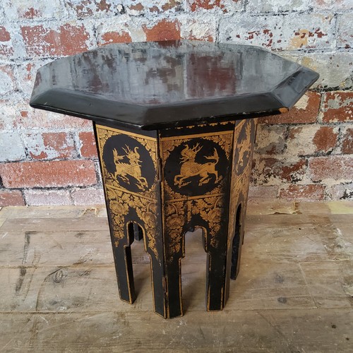 65 - A papier mache octagonal occasional table