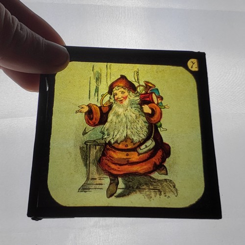 44 - Magic lantern slides including coloured slides from a Christmas series, Eddystone Lighthouse -night,... 