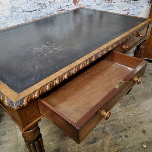 139 - A William IV mahogany library desk in the manner of Gillows, tooled black leather inlaid writing sur... 