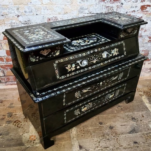 156 - An Asian black lacquered mother of pearl inlaid temple chest of drawers profusely inlaid throughout ... 