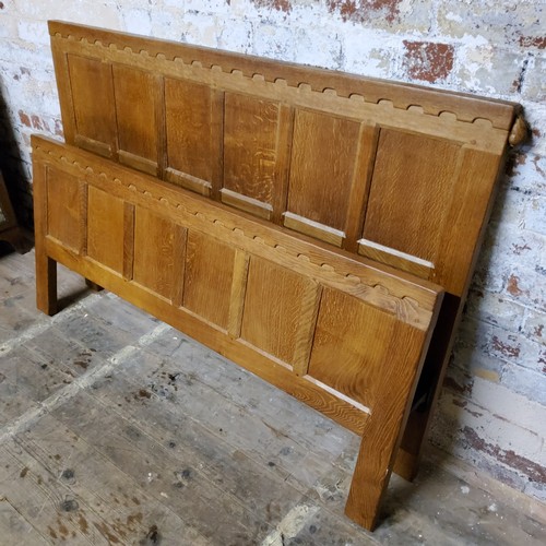 161 - Rabbitman: Peter Heap (Wetwang) an English golden oak double headboard and footboard with carved rab... 