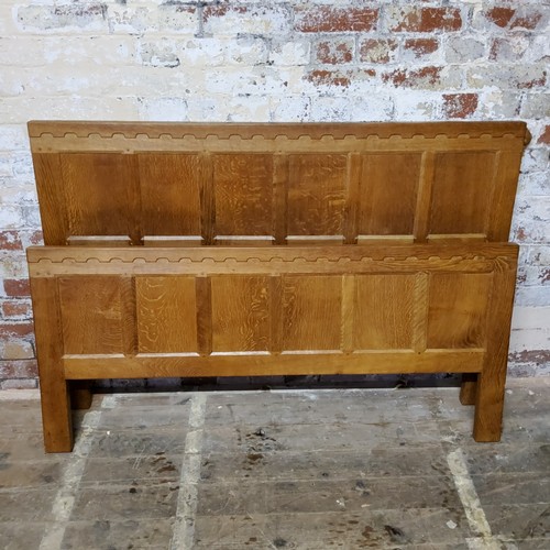 161 - Rabbitman: Peter Heap (Wetwang) an English golden oak double headboard and footboard with carved rab... 