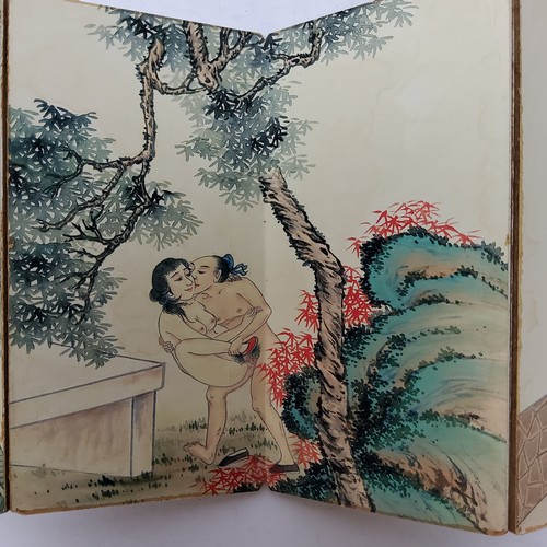 64 - Erotica - an unusual Japanese concertina erotic pillow book, the ten fold out board leaves decorated... 