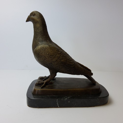 90 - Pigeon Racing Interest - a prize winning pigeon, mounted on a stepped bronze and marble base 24cm hi... 