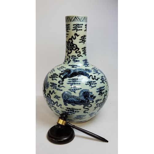 106 - A very large and impressive Chinese temple vase decorated with an all-over, underglaze blue and whit... 