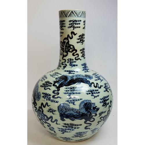 106 - A very large and impressive Chinese temple vase decorated with an all-over, underglaze blue and whit... 