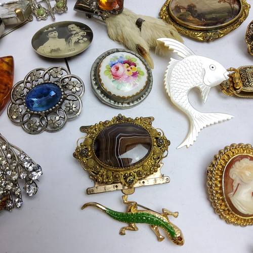 166 - Costume Jewellery - various brooches and bangles, including a reverse painted brooch, banded agate p... 