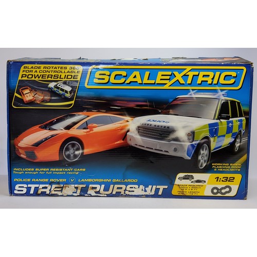 195 - Scalextric Street Pursuit in 1/32nd scale including Police Range Rover, Lamborghini Gallardo with wo... 