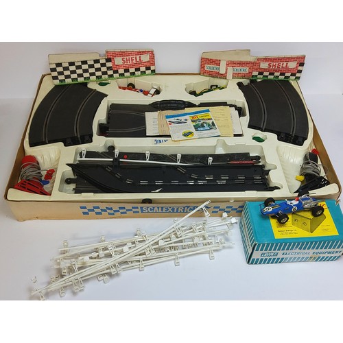 201 - A Scalextric Grand Prix model motor racing set, No 75, includes fly over bridge and change overs 1 C... 