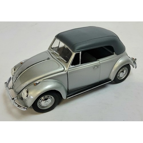 218 - Franklin Mint - a 1967 VW Beetle Convertible, in the harder to find silver, black interior, black re... 