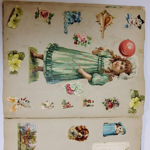 38 - An Edwardian scrap book, each page well layed out including early Victorian inclusions