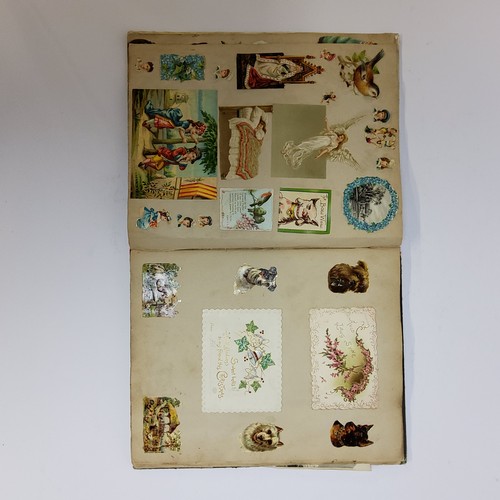 38 - An Edwardian scrap book, each page well layed out including early Victorian inclusions