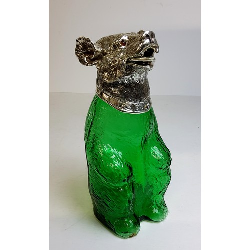 126 - A novelty green glass decanter, in the form of a bear, with plated metal mounts, 23 cm high