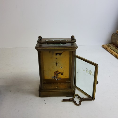 73A - A 19th century French Corniche carriage clock, the backplate stamped with S  F , cream enamel c... 