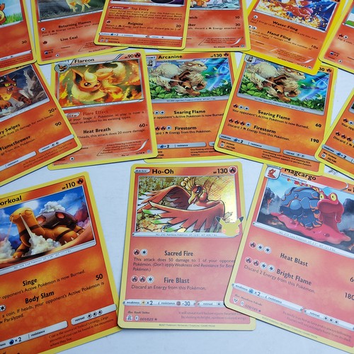 253 - Pokemon - Fire Energy including holographic 'shiny' Ho-oh, Growlithe, Heatmore, Torkoal, Arcanine, M... 