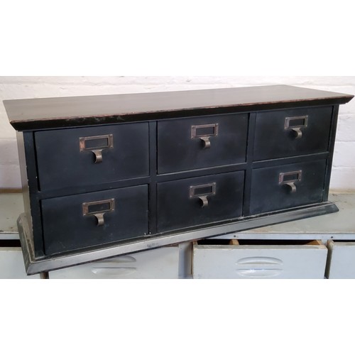 258 - A bank of six haberdashery drawers, painted black, 20th century, 71cm wide x 27.5cm high x 23.5cm de... 