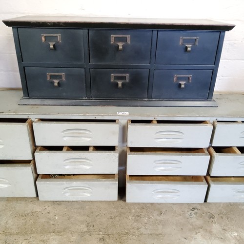 258 - A bank of six haberdashery drawers, painted black, 20th century, 71cm wide x 27.5cm high x 23.5cm de... 