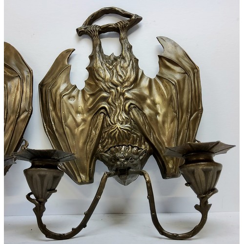 273 - An unusual pair of large bronze bat wall sconces, scrolling arms terminating with spider web shaped ... 