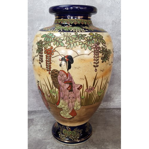 76 - A Japanese Satsuma baluster shaped vase decorated with an affluent lady of Title with her daughters ... 