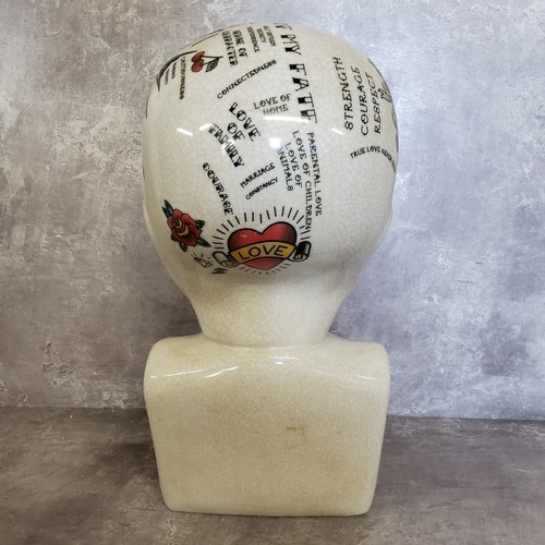 326 - A large modern crackle glazed 'phrenology' bust with Ed Hardy style tattoo decoration