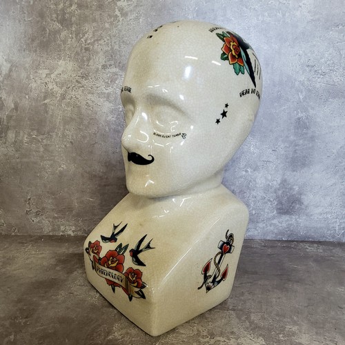 326 - A large modern crackle glazed 'phrenology' bust with Ed Hardy style tattoo decoration